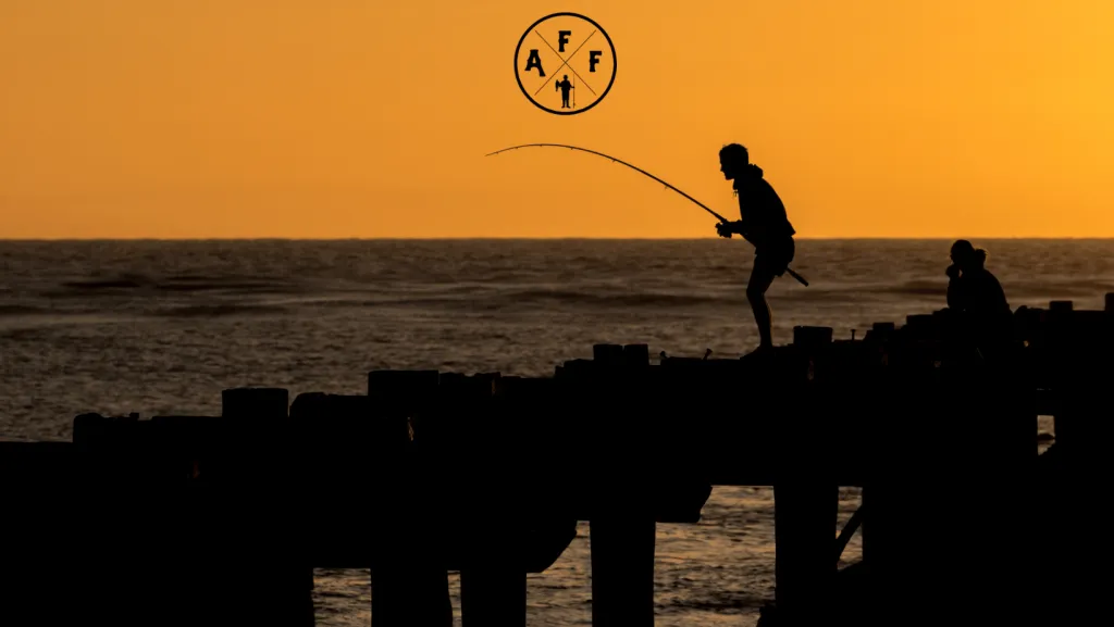 Fishing with a spinning reel on a pier