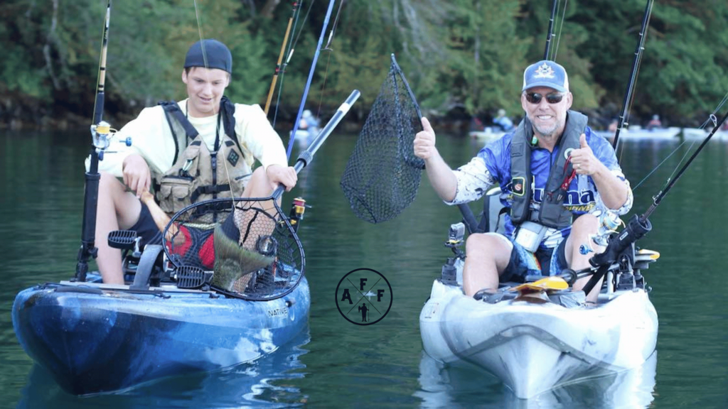 two men with the best kayak fishing accessories