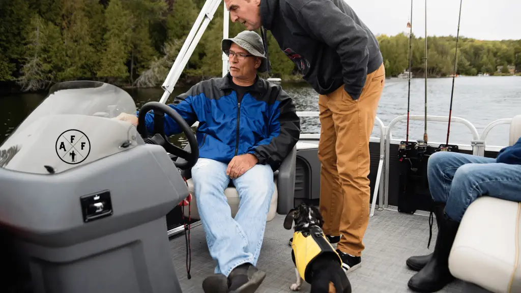 men looking at best fish finder for pontoon boats