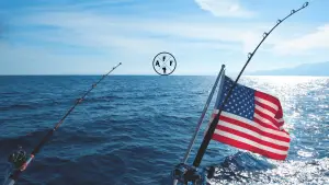 American flag on boat with fishing rods